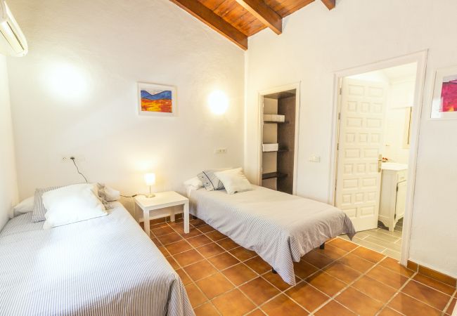 Dormitorio de esta casa rural en Alhaurín el Grande