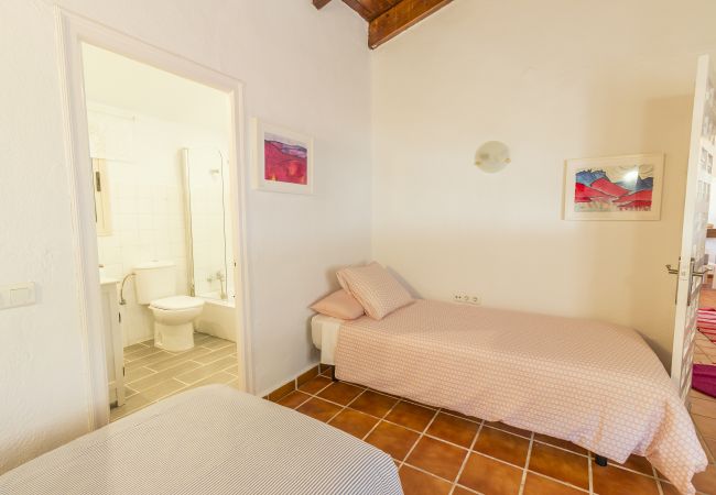 Dormitorio de esta casa rural en Alhaurín el Grande