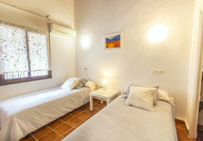 Dormitorio de esta casa rural en Alhaurín el Grande