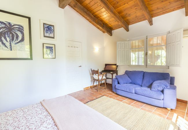 Dormitorio de esta casa rural en Alhaurín el Grande