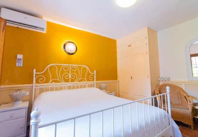 Dormitorio de este apartamento rural en Mijas Pueblo