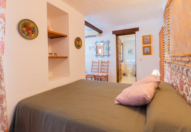 Dormitorio de este apartamento rural en Mijas Pueblo