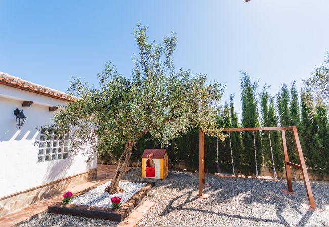 Zona de juego de esta casa rural en Alhaurín el Grande