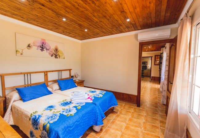 Dormitorio de esta casa rural en Alhaurín el Grande