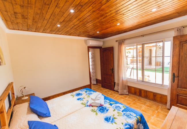 Dormitorio de esta casa rural en Alhaurín el Grande