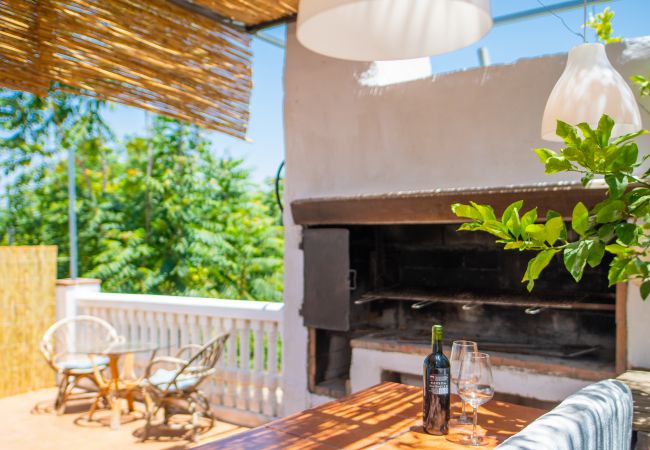 Barbacoa de esta casa rural en Coín