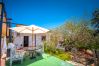 Terraza de esta casa rural en Coín