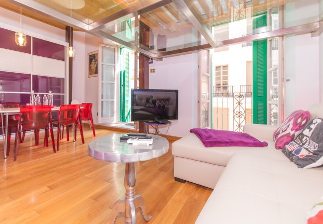 Salón de este apartamento en el centro de Málaga