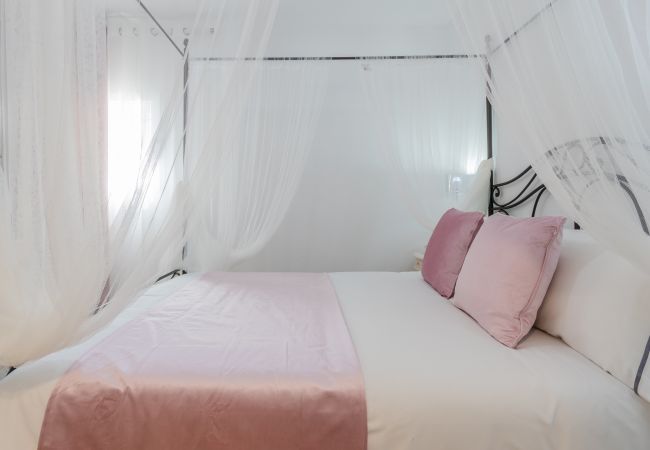 Dormitorio de esta casa rural en la Estación de Cártama