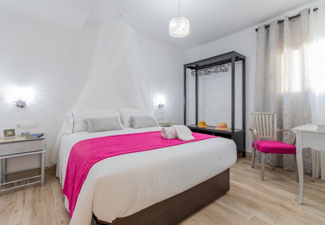 Dormitorio de esta casa rural en la Estación de Cártama