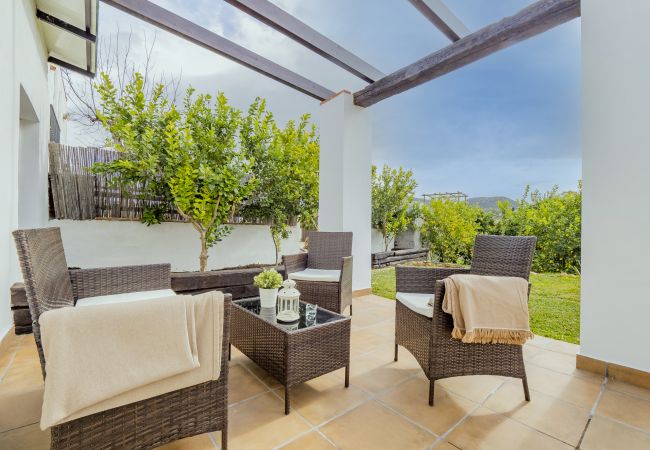 Terraza de esta casa rural en Cártama
