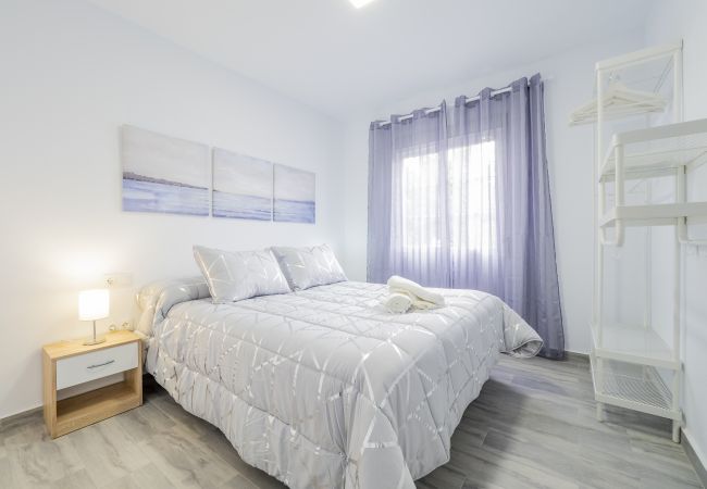 Dormitorio de esta casa rural en Cártama