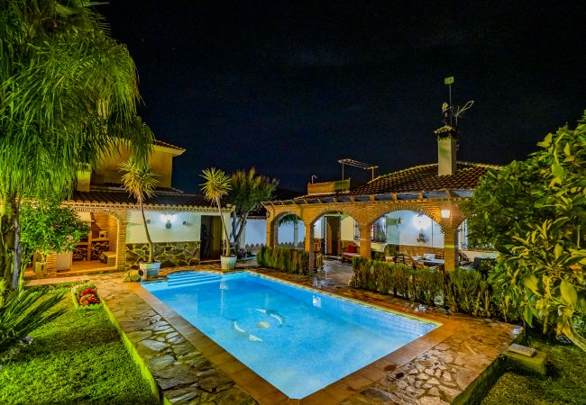 Piscina de esta casa rural en Alhaurín el Grande