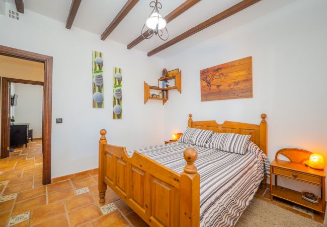 Dormitorio de esta casa rural en Alhaurín el Grande