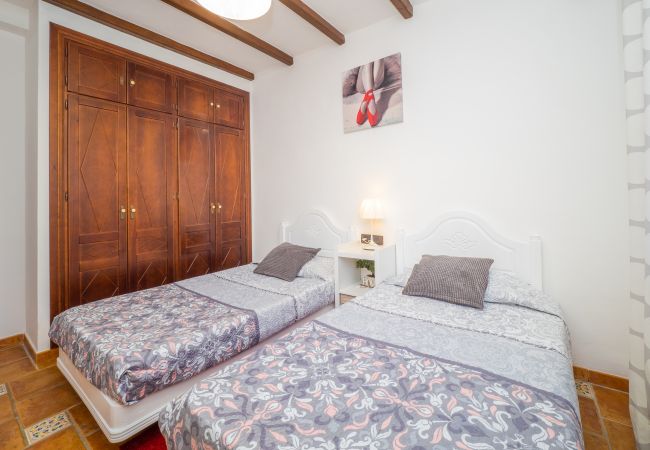 Dormitorio de esta casa rural en Alhaurín el Grande