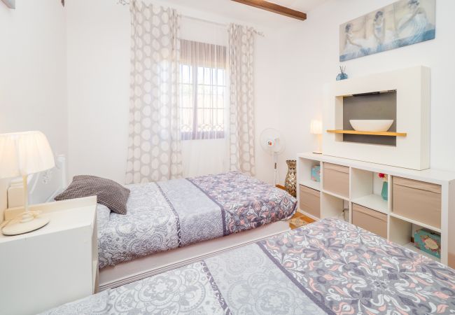 Dormitorio de esta casa rural en Alhaurín el Grande
