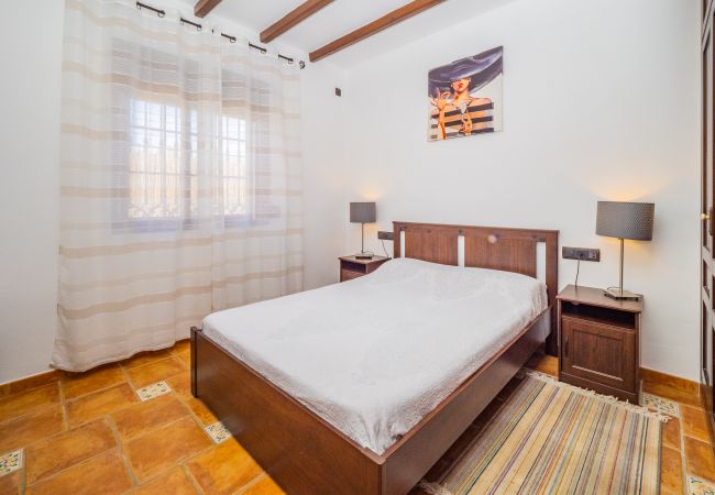Dormitorio de esta casa rural en Alhaurín el Grande