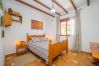 Dormitorio de esta casa rural en Alhaurín el Grande