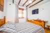 Dormitorio de esta casa rural en Alhaurín el Grande