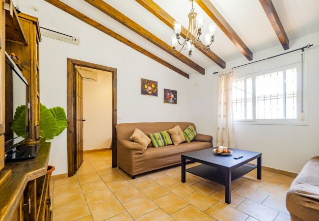 Salón de esta casa rural en Pizarra