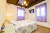 Dormitorio de esta casa rural en Pizarra