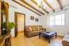 Salón de esta casa rural en Pizarra