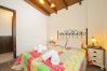 Dormitorio de esta casa rural en Pizarra