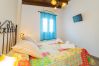 Dormitorio de esta casa rural en Pizarra
