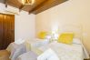 Dormitorio de esta casa rural en Pizarra