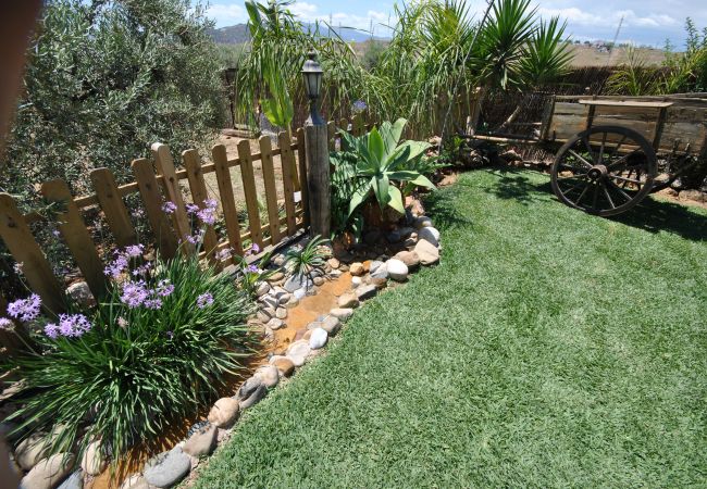 Garden of this house with fireplace in Alhaurín el Grande