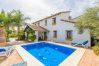 Pool of this house with fireplace in Alhaurín el Grande
