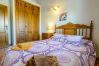 Bedroom of this house with fireplace in Alhaurín el Grande