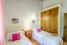 Bedroom of this house with fireplace in Alhaurín el Grande