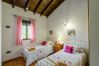 Bedroom of this house with fireplace in Alhaurín el Grande