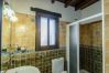 Bathroom of this house with fireplace in Alhaurín el Grande