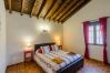 Bedroom of this house with fireplace in Alhaurín el Grande