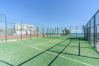 Paddle tennis courts in the common areas of this apartment in Marbella