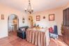 Dining room with fireplace in this country estate in Alhaurín el Grande