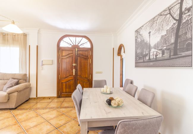 Living room with fireplace in this luxury country house in Alhaurín el Grande