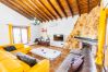 Living room with fireplace in this villa in Alhaurín el Grande