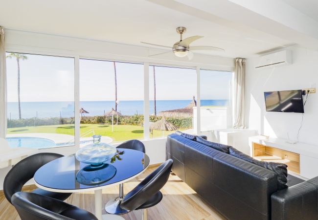 General view of living room with views of the sea 