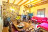 Living room with fireplace of this country house in Alhaurín el Grande