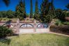 Garden of this rural apartment in Mijas Pueblo