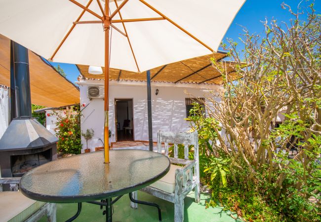 Terrace of this rural house in Coín