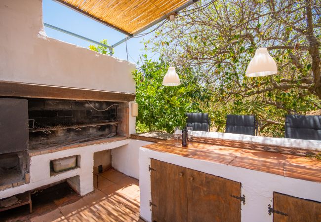 Barbacoa de esta casa rural en Coín