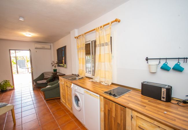 Kitchen of this rural house in Coín