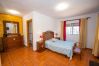 Bedroom of this rural house in Coín