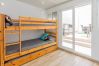Bedroom with bunk beds in this apartment in Rincón de la Victoria