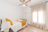 Bedroom of this house with fireplace in El Torcal