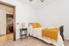 Bedroom of this house with fireplace in El Torcal